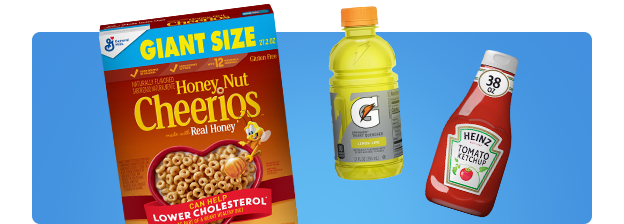 Box of cheerios next to gatorade and a bottle of ketchup.