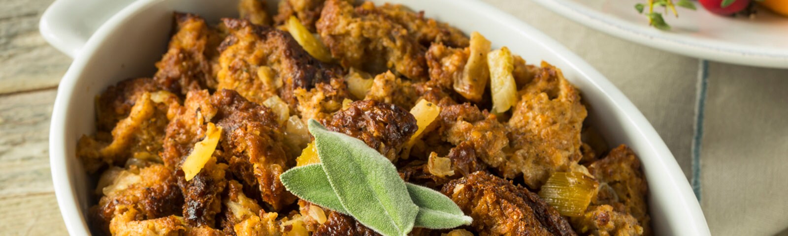Traditional Thanksgiving stuffing in a casserole dish on a table