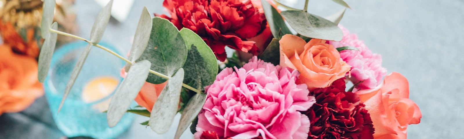 Orange pink and red carnations