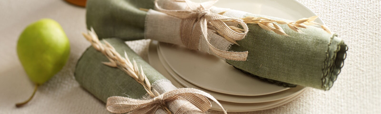 Napkins rolled up with burlap
